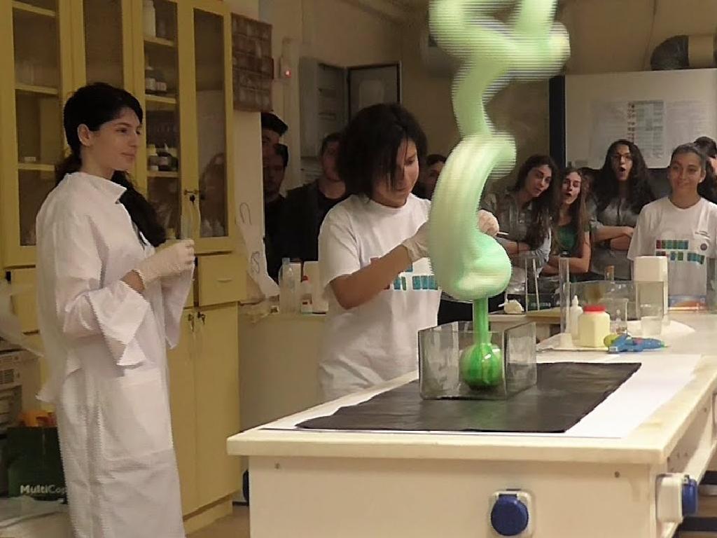 students watching experiment