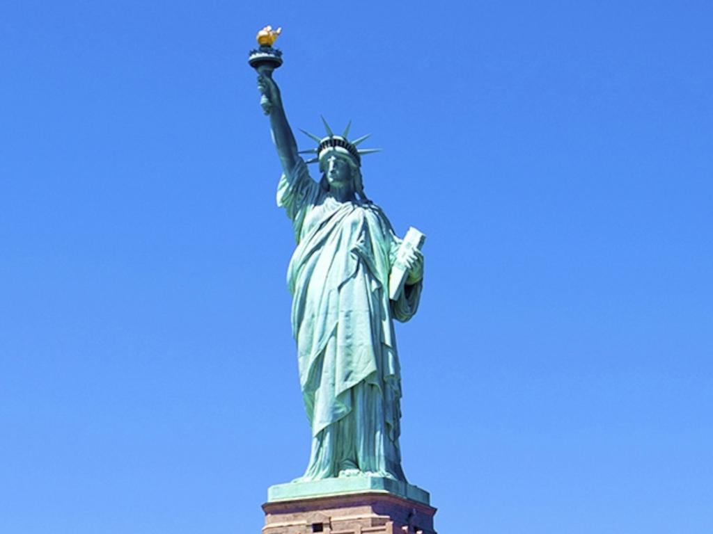 liberty statue blue sky